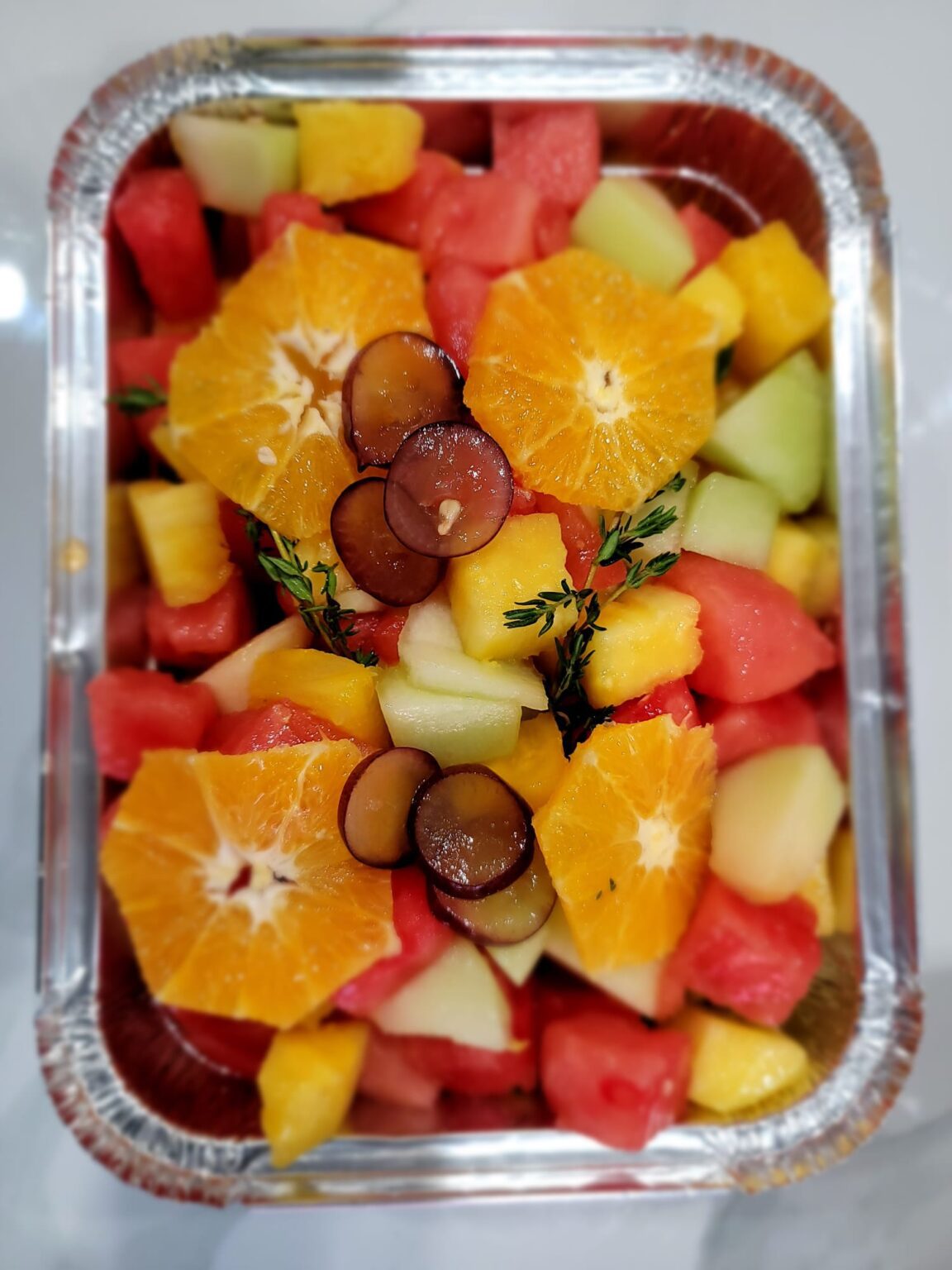 fresh-fruit-salad-big-foil-pan-honeydew-melon-cantaloupes