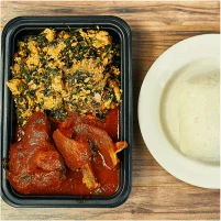 Nigerian Egusi Soup with Ponmo and Pounded Yam